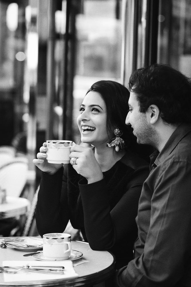best photos of couples indian girl laughing with coffe in her hands
