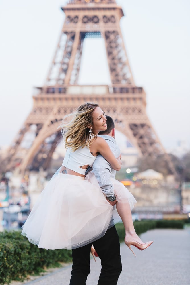 couple portraits photography - gentleman carrying his wife dressed with tutu dress and high heels