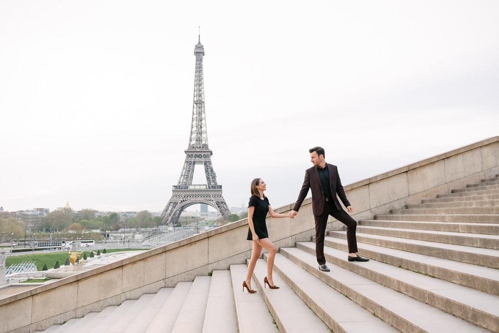 couples photo poses ideas - walking up on stairs
