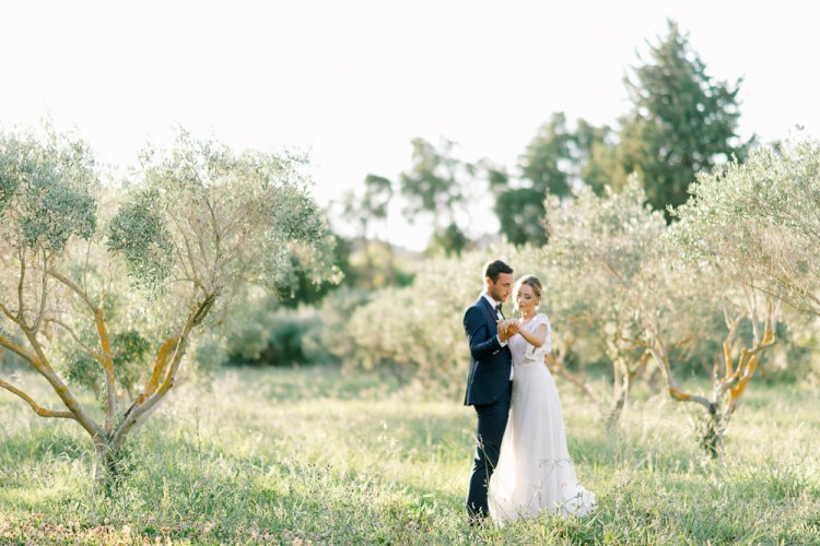 Destination wedding in Provence - France - Bride and groom dancing in olive garden on their wedding day