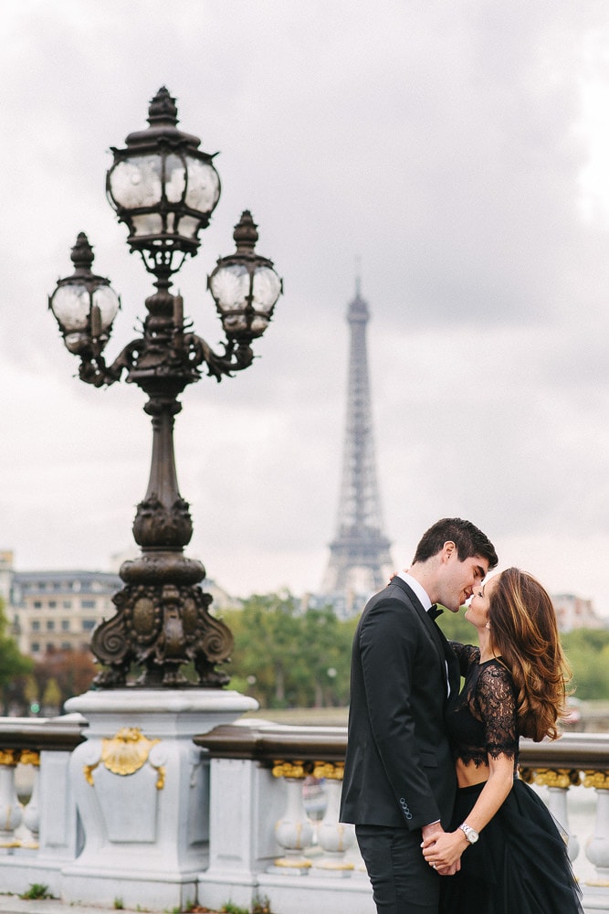 engagement photos paris couple from miami kissing in paris