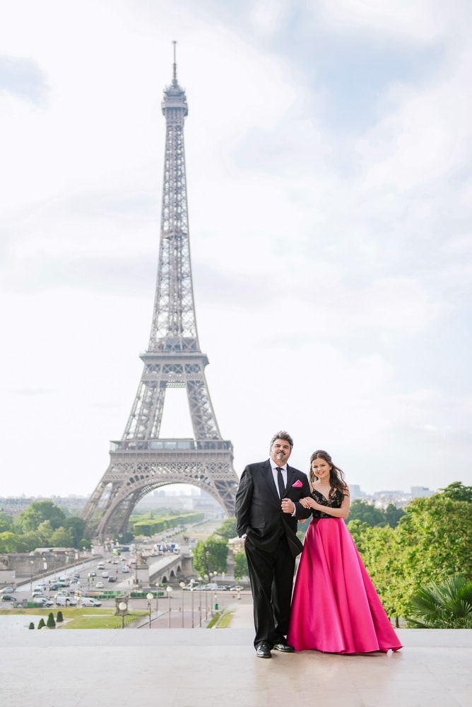 Father walking with daughter on quince photo shoot in Paris