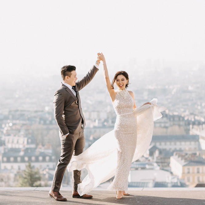 Happy pre wedding dancing photo in Montmartre Paris France by Odrida
