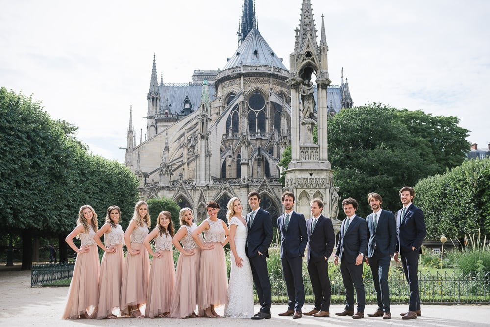 Paris elopement photographer - Bridal party and groomsmen at the Notre Dame cathedral