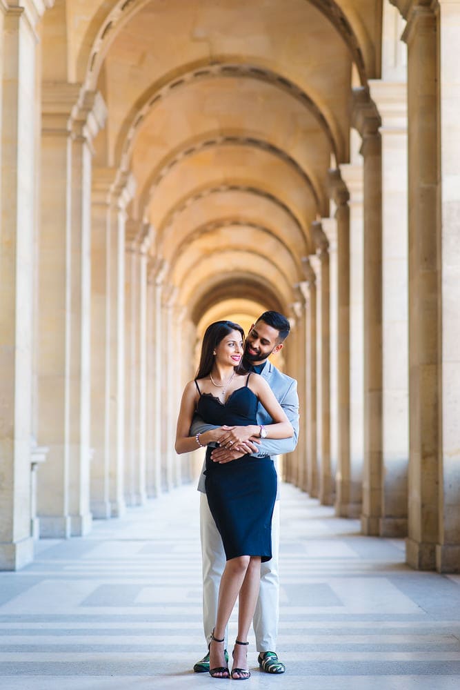 paris engagement indian couple just got engaged and posing for pictures at the louvre museum