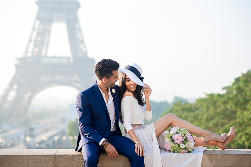 Couple from California taking engagement photos in Paris