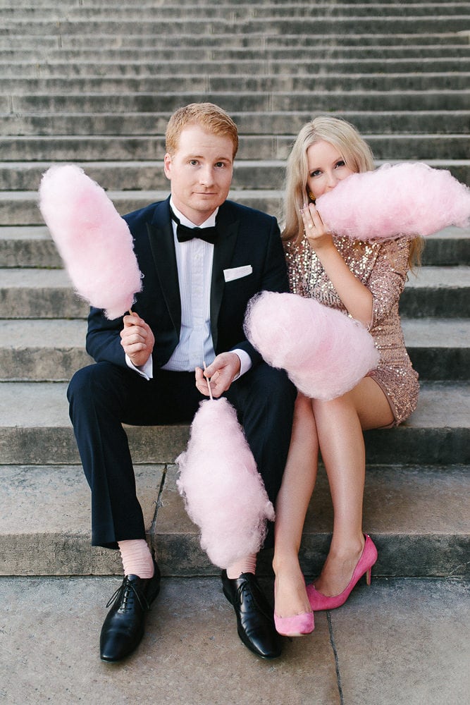 paris engagement photos with cotton candy and fancy pink shoes