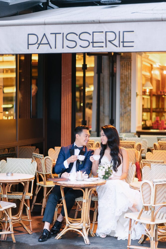 paris pre wedding bride and groom having coffee together at cafe carette