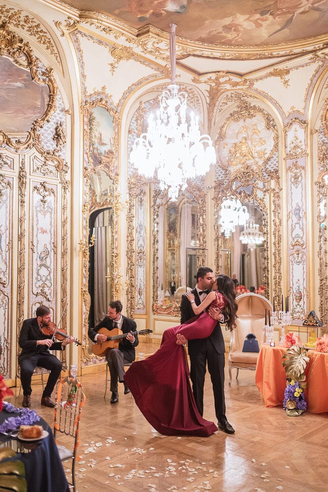 Paris proposal planner - newly engaged indian guy carrying his fiance in the crystal room ballroom