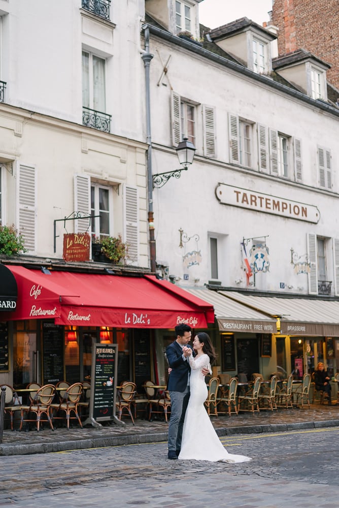 Romantic couple dancing in the streets of Montmartre