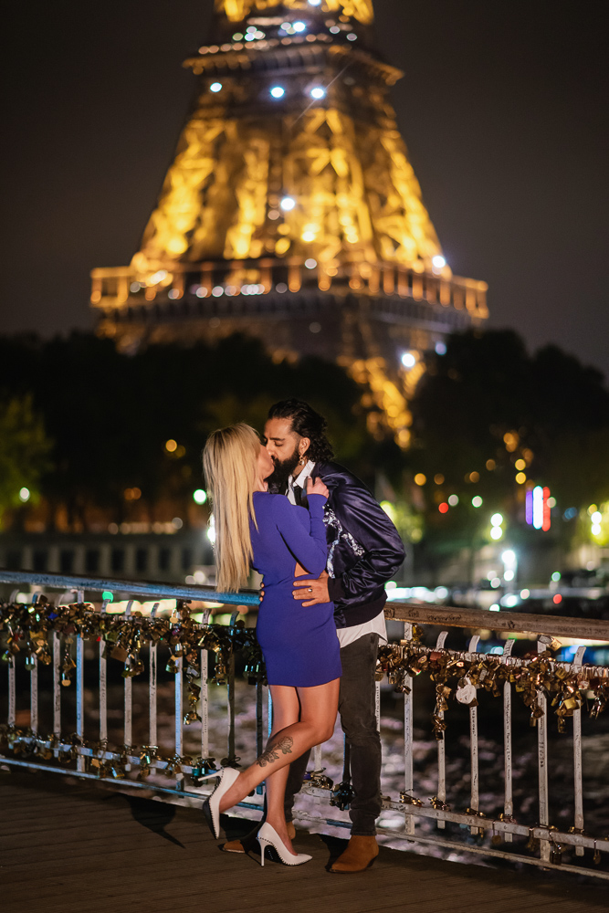 Romantic night pictures on a bridge near the Eiffel Tower in Paris