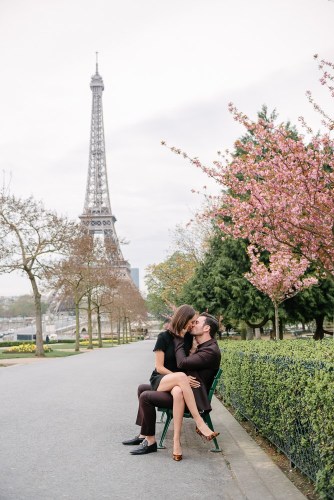 Romantic portraits with cherry blossoms at Eiffel Tower in Paris