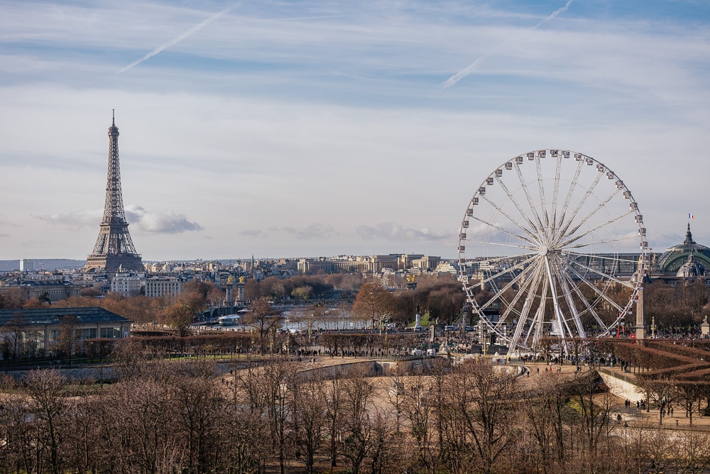 The view over the city of Paris from Le Meurice hotel - Eiffel Tower and the Ferris Wheel