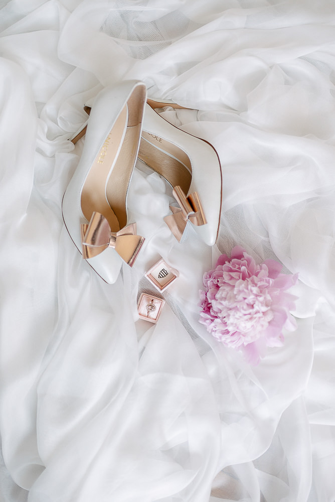 Wedding details - bridal shoes and wedding ring