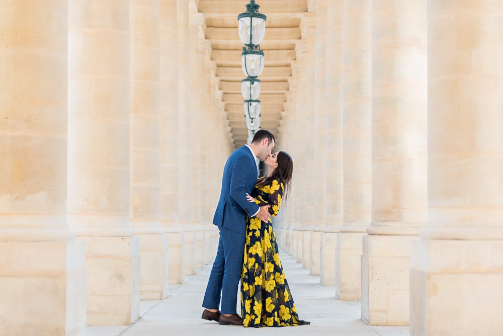 Photoshoot outfit option with yellow flowers flowy dress for her and blue suit for him